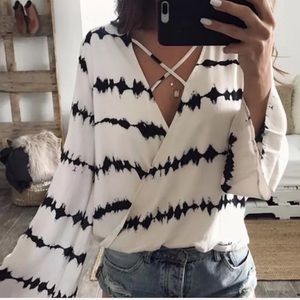 Long sleeve plunging neck blouse